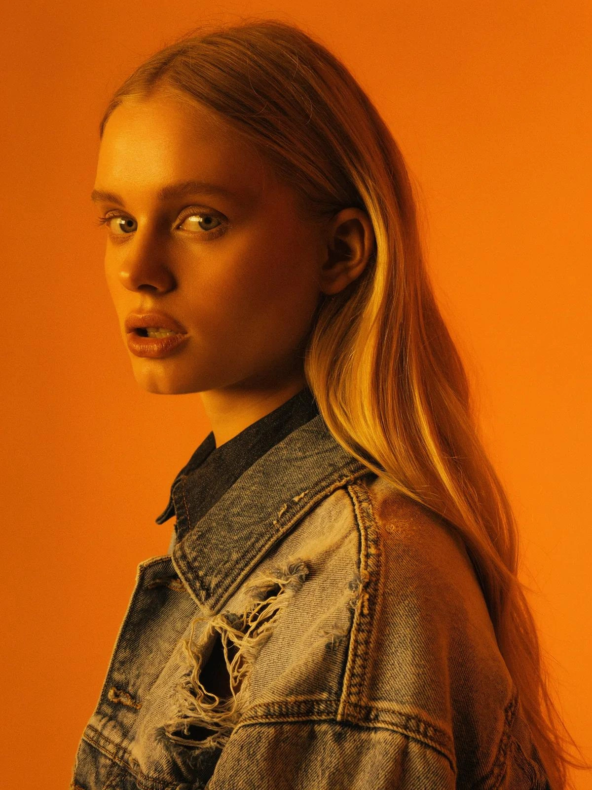 Orange denim portrait — official Black Forest Labs flux-3-image-klein showcase