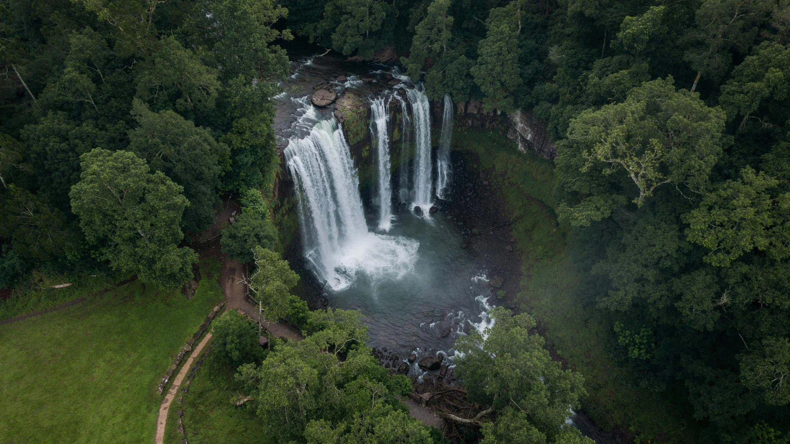 Forest waterfall aerial — official Black Forest Labs flux-3-image showcase